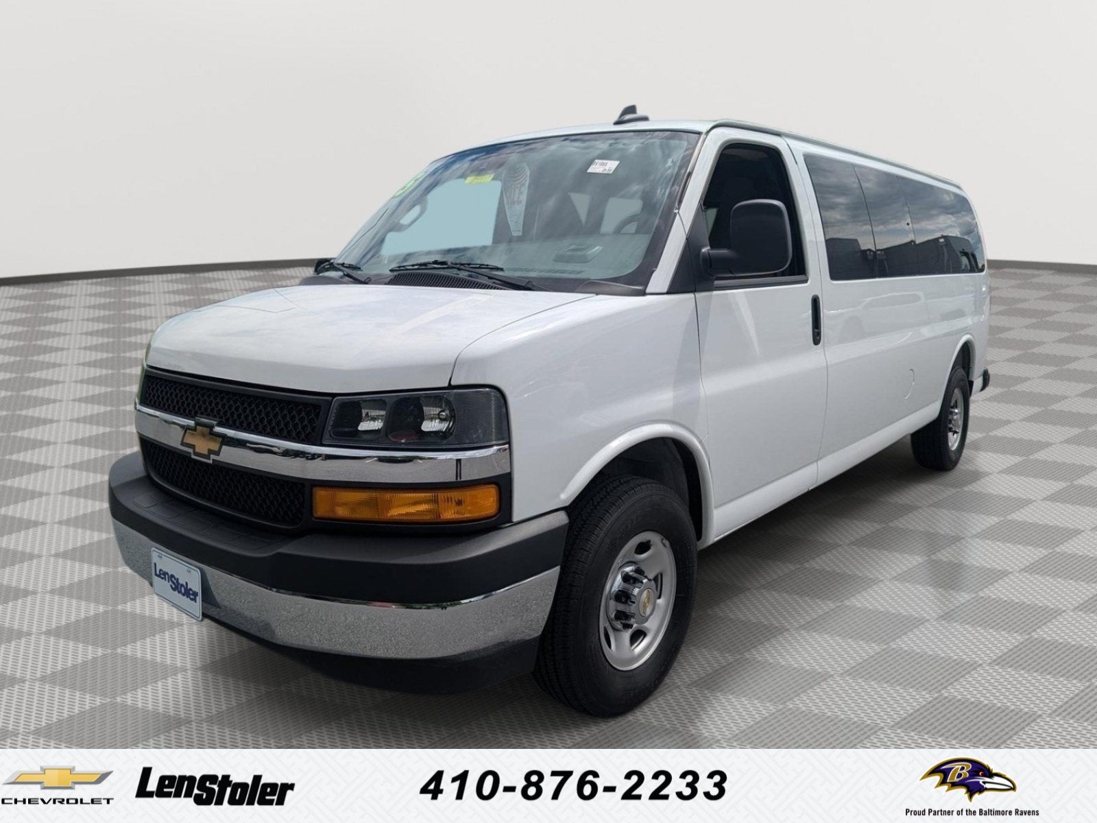 2025 Chevrolet Express Passenger 1LT in Summit White — front three-quarter view