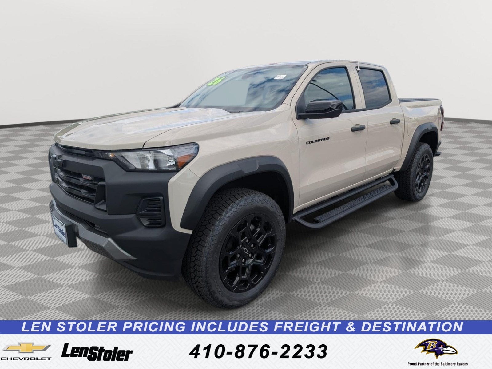 2026 Chevrolet Colorado Trail Boss in White Sands — front three-quarter view