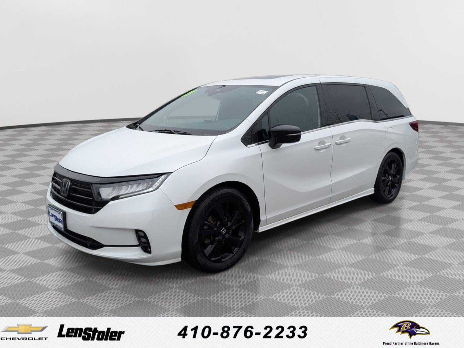 2023 Honda Odyssey Sport in White — front three-quarter view