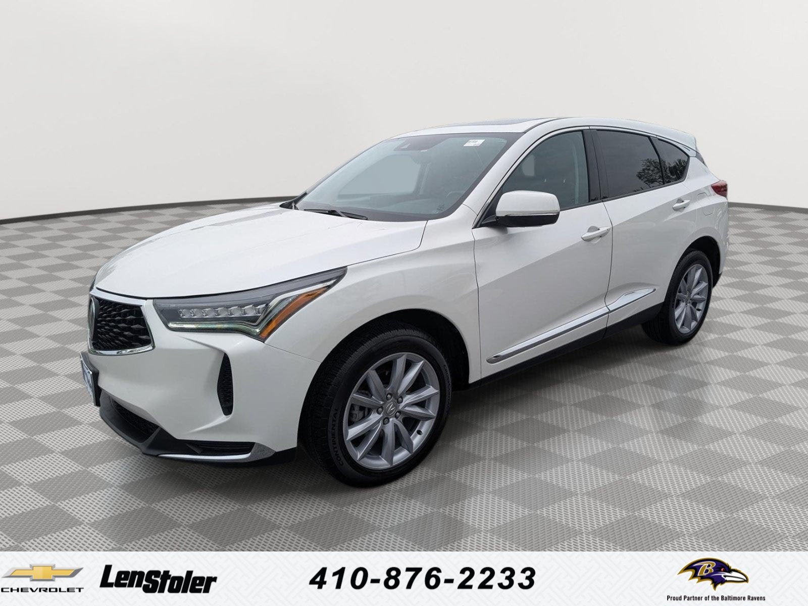 2023 Acura RDX SH-AWD in White — front three-quarter view