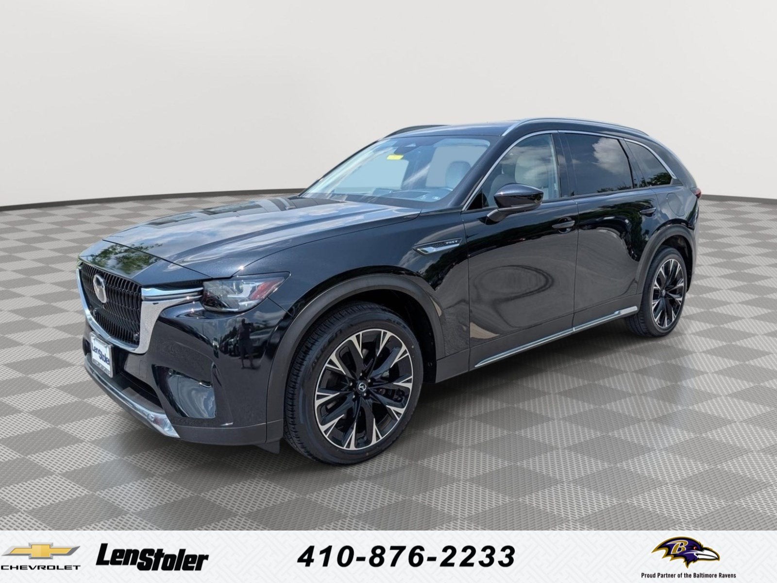 2024 Mazda Mazda CX-90 PHEV Premium Plus in Black — front three-quarter view