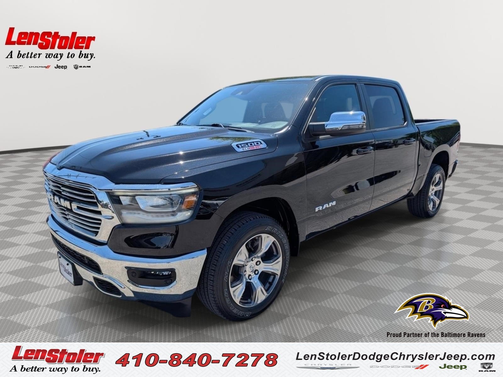 2023 RAM 1500 Laramie in Diamond Black Crystal Pearlcoat — front three-quarter view