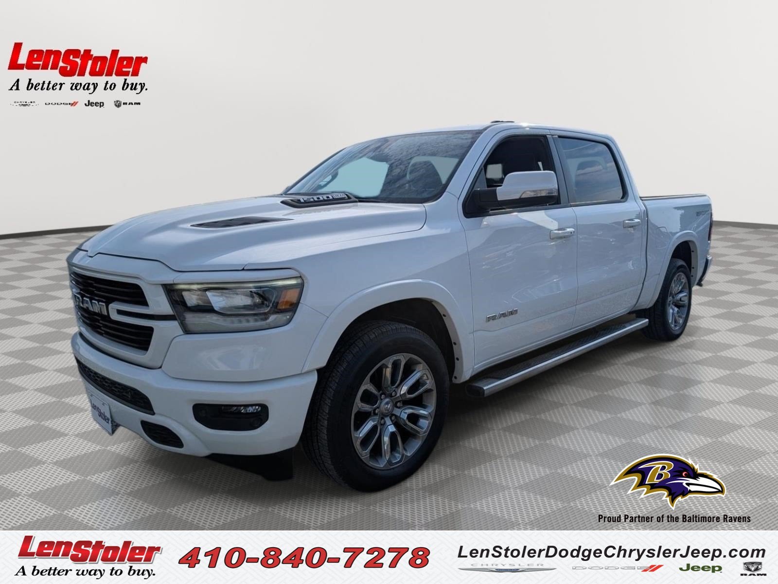 2021 RAM 1500 Laramie in Bright White Clearcoat — front three-quarter view