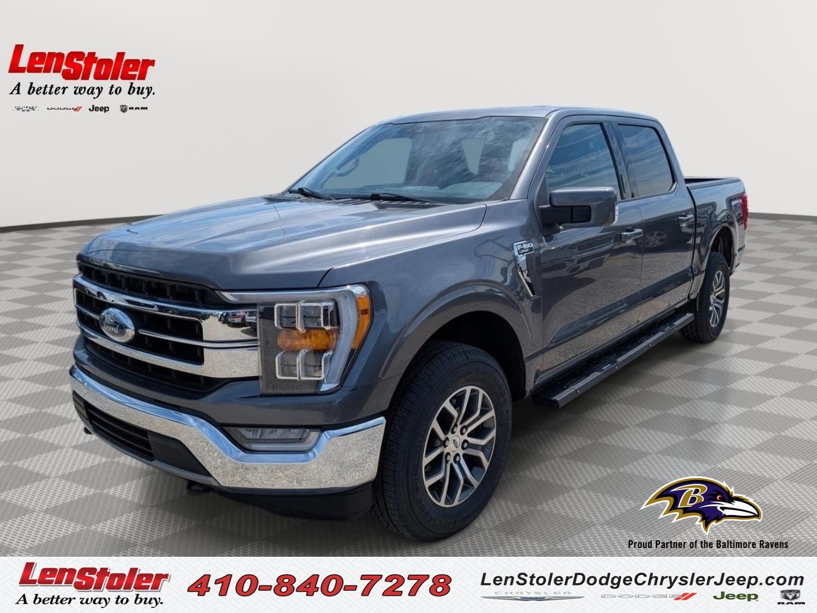 2021 Ford F-150 LARIAT in Stone Gray Metallic — front three-quarter view