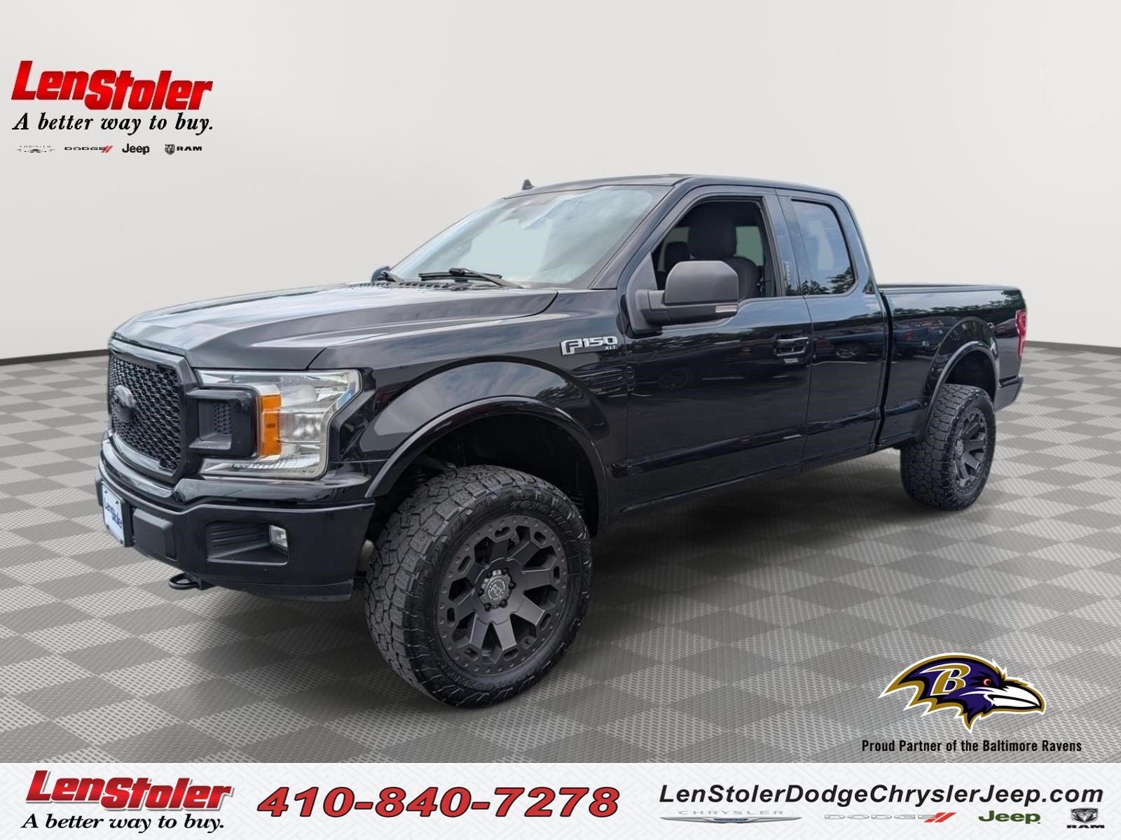 2019 Ford F-150 XLT in Agate Black Metallic — front three-quarter view