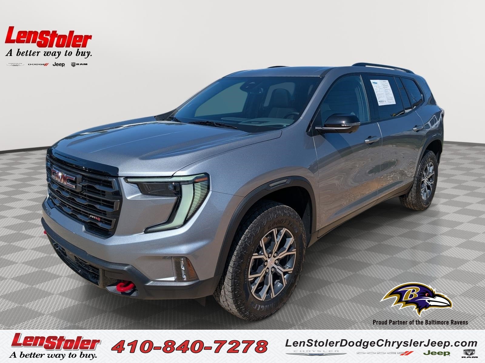 2025 GMC Acadia AWD AT4 in Sterling Metallic — front three-quarter view