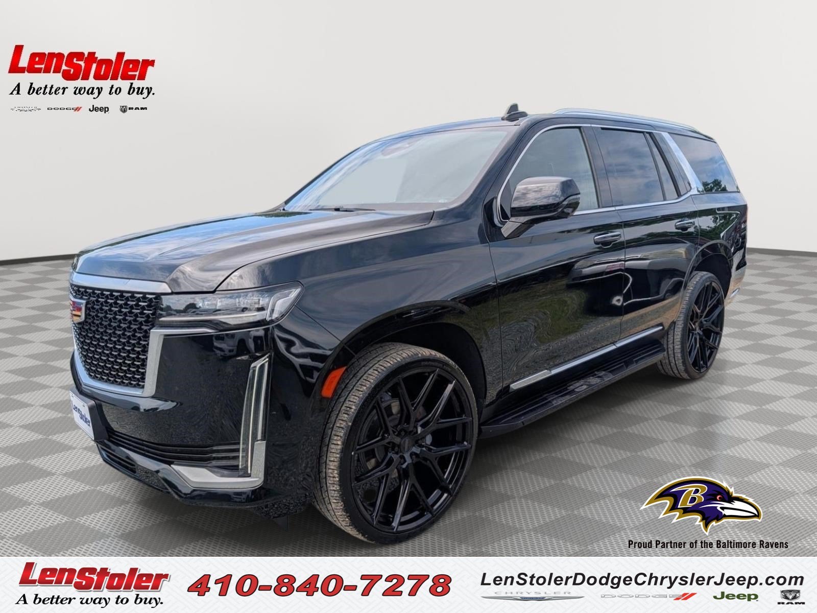 2023 Cadillac Escalade 4WD Luxury in Black Raven — front three-quarter view