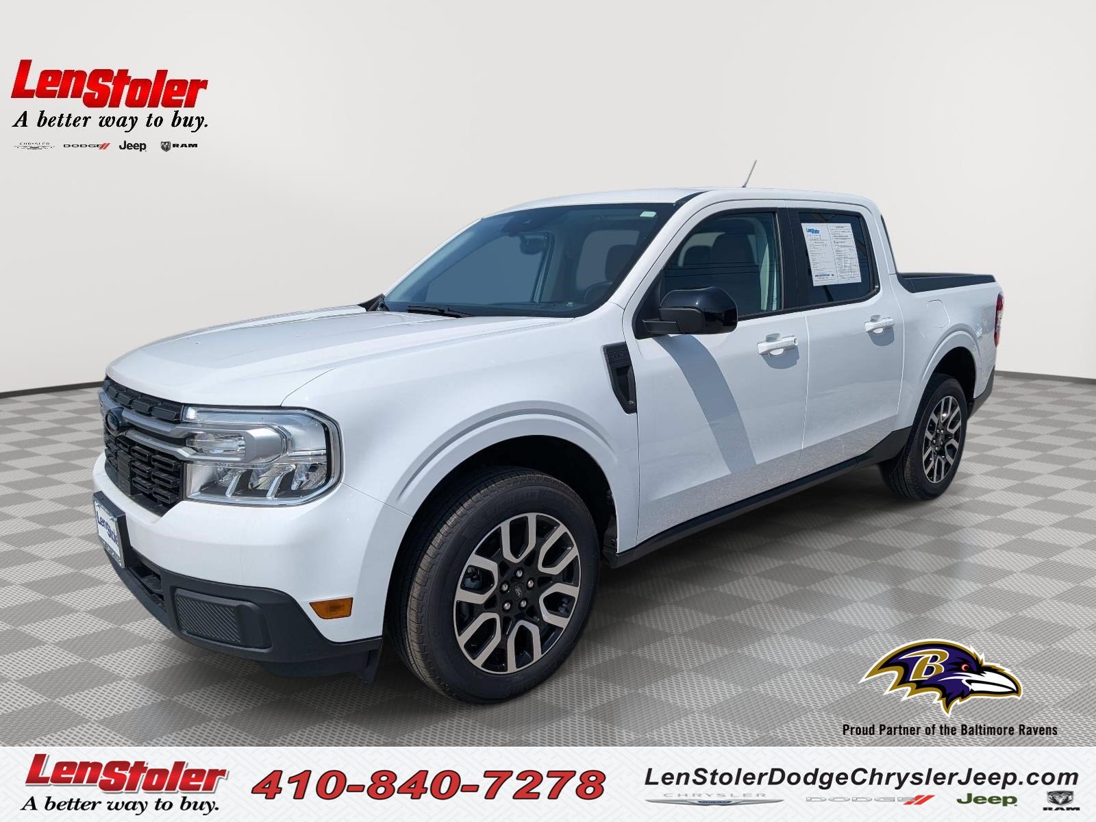 2024 Ford Maverick LARIAT in Oxford White — front three-quarter view