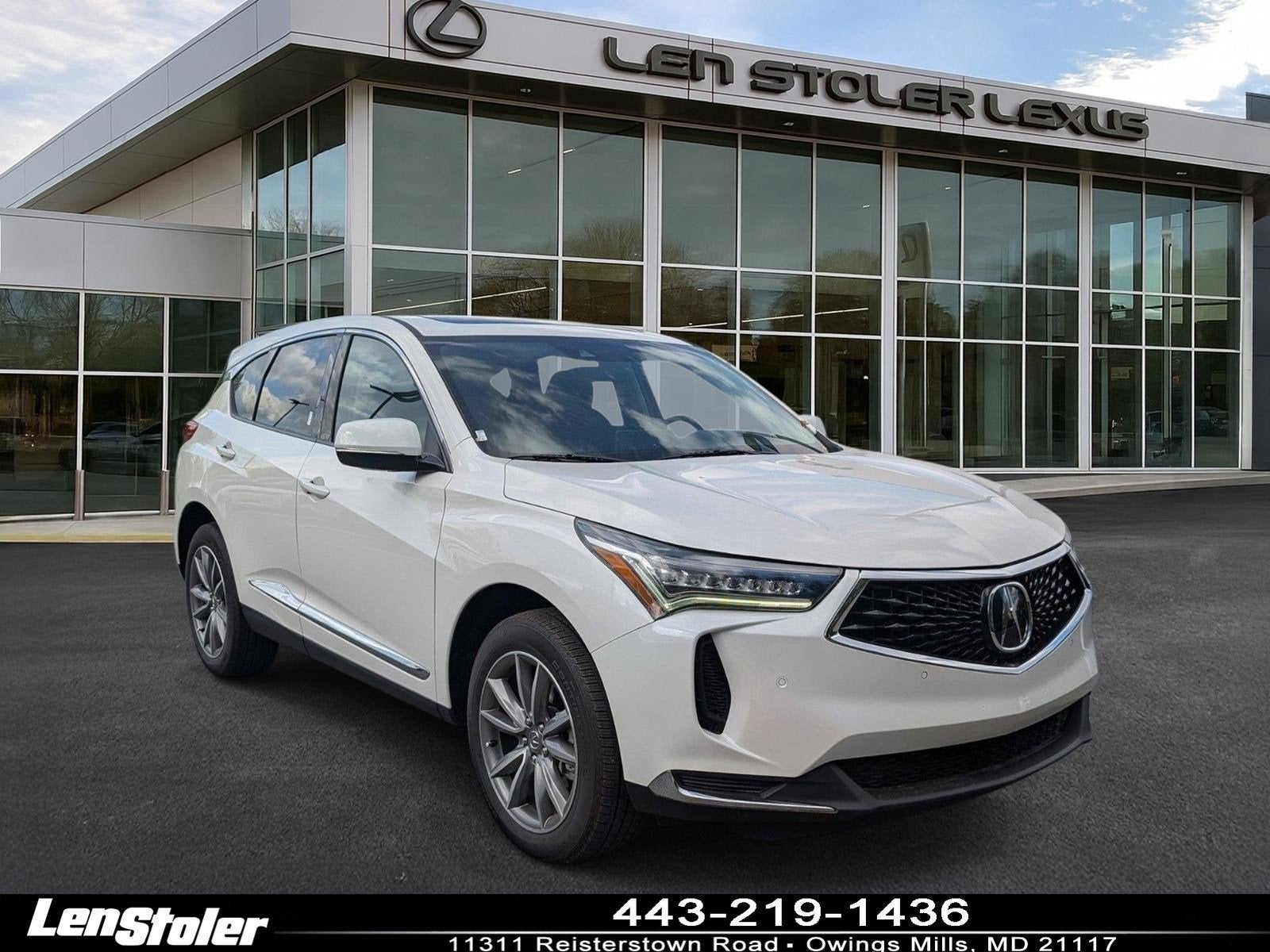 2024 Acura RDX w/Technology Package in Platinum White — front three-quarter view