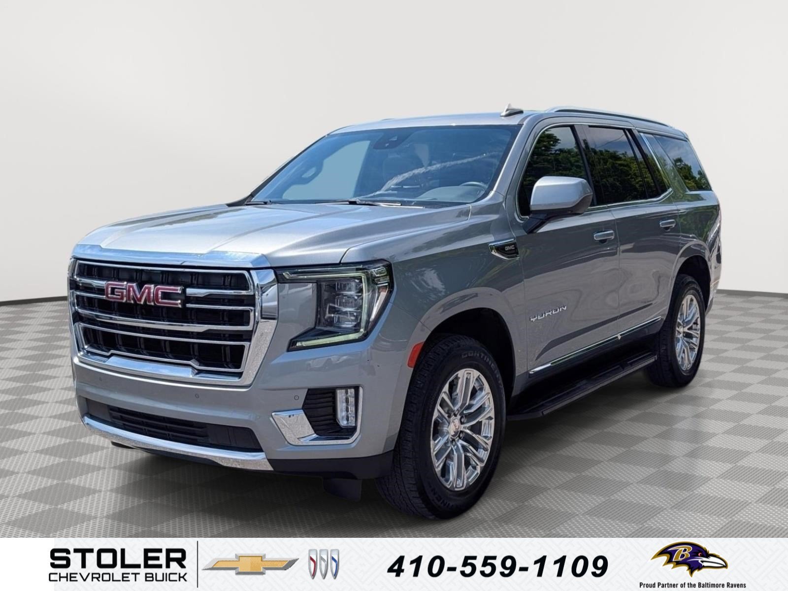2024 GMC Yukon SLT in Sterling Metallic — front three-quarter view