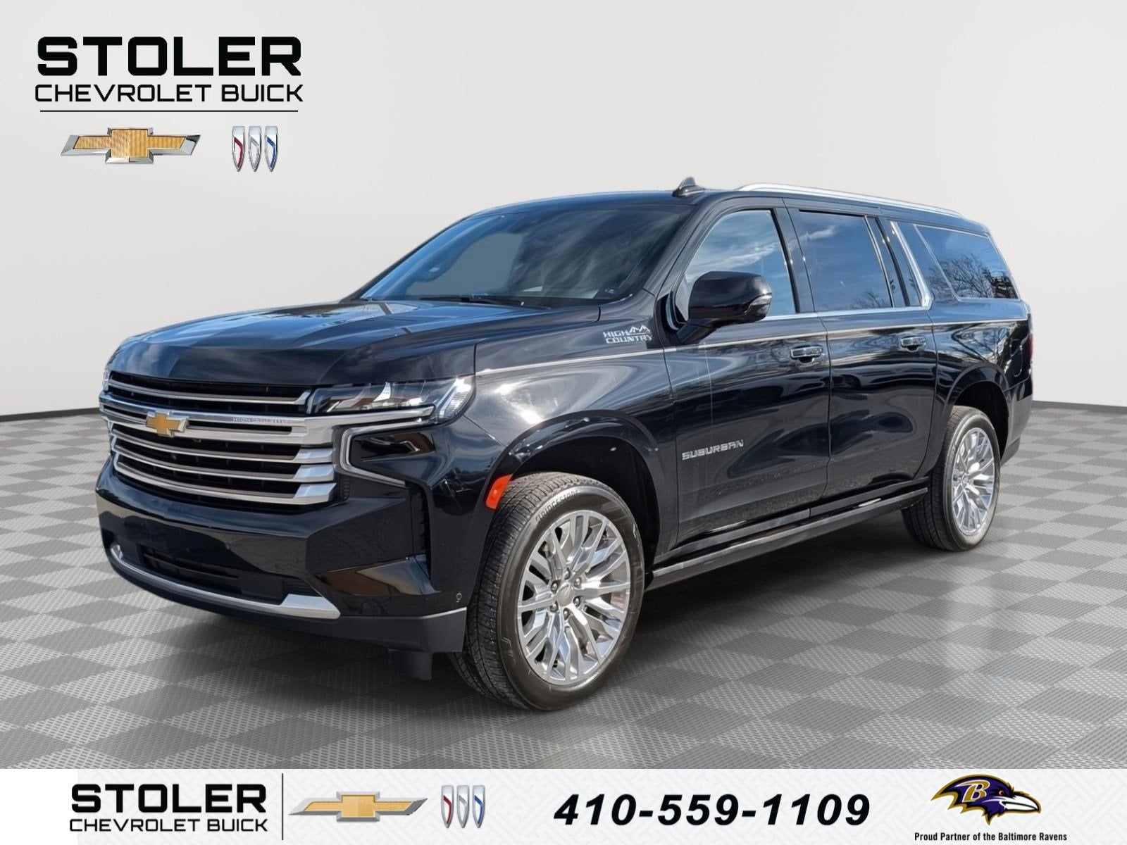 2023 Chevrolet Suburban High Country in Black — front three-quarter view