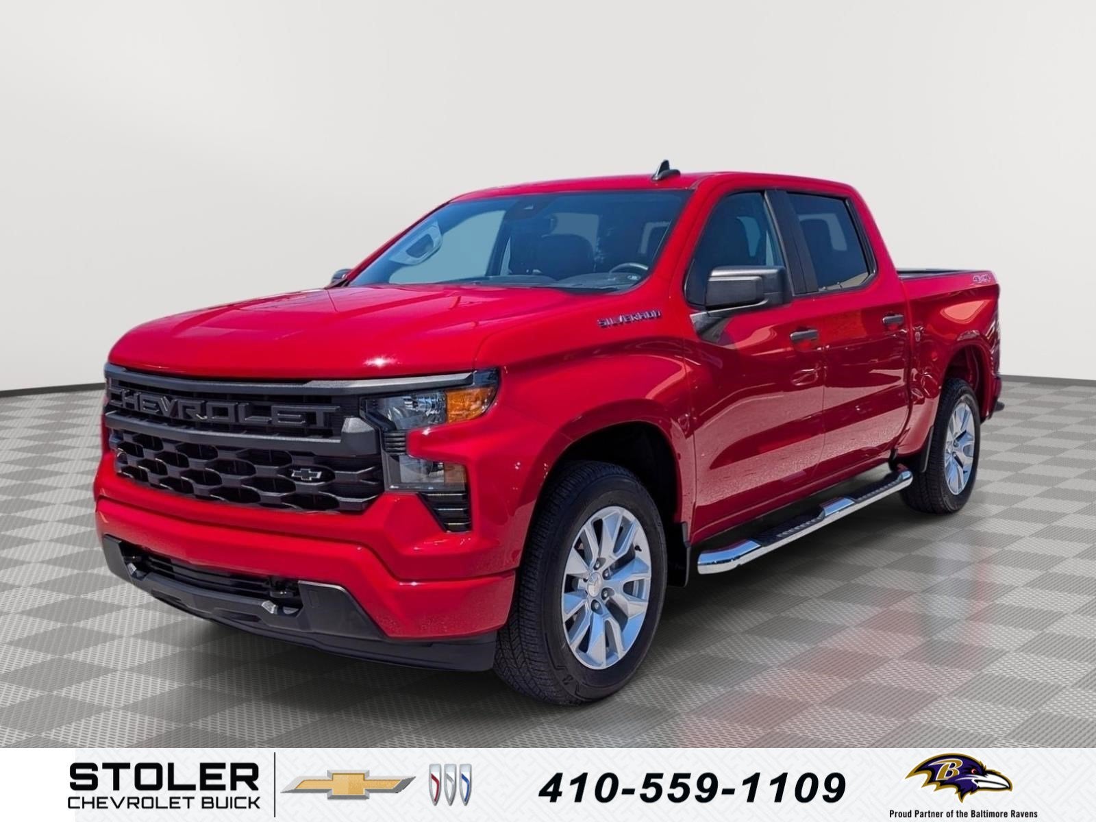 2022 Chevrolet Silverado 1500 Custom in Red Hot — front three-quarter view