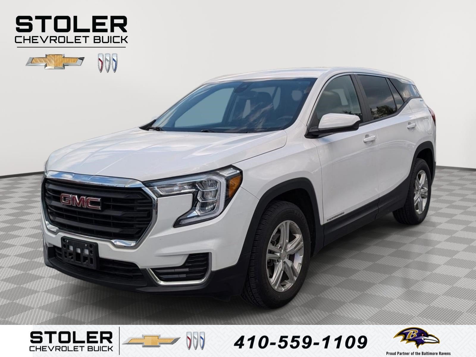 2024 GMC Terrain SLE in Summit White — front three-quarter view