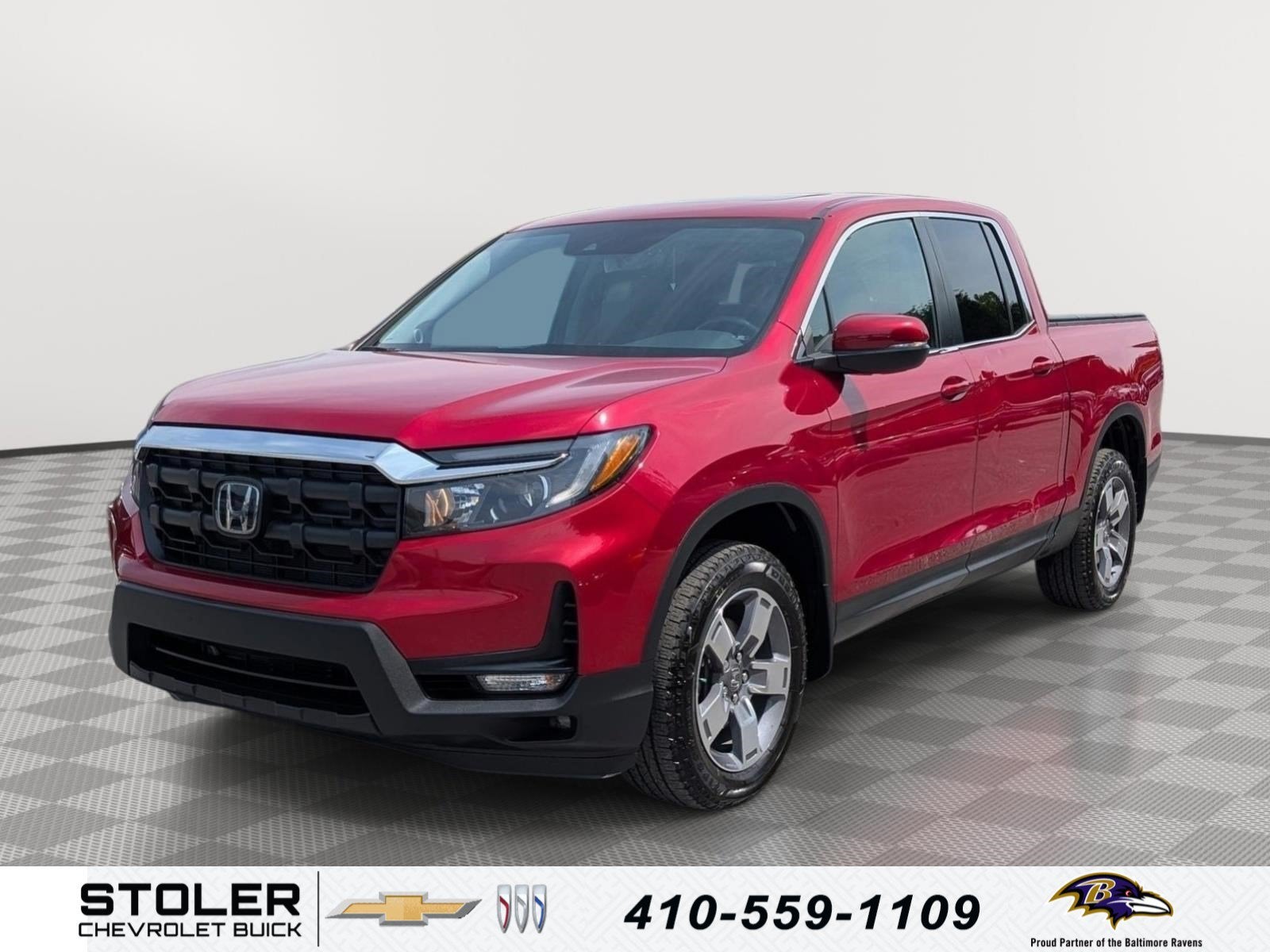 2024 Honda Ridgeline RTL in Red — front three-quarter view