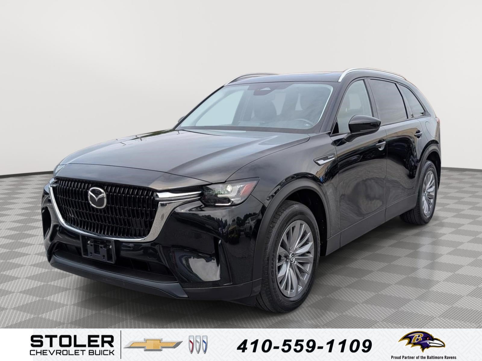 2024 Mazda Mazda CX-90 PHEV Preferred in Jet Black Mica — front three-quarter view